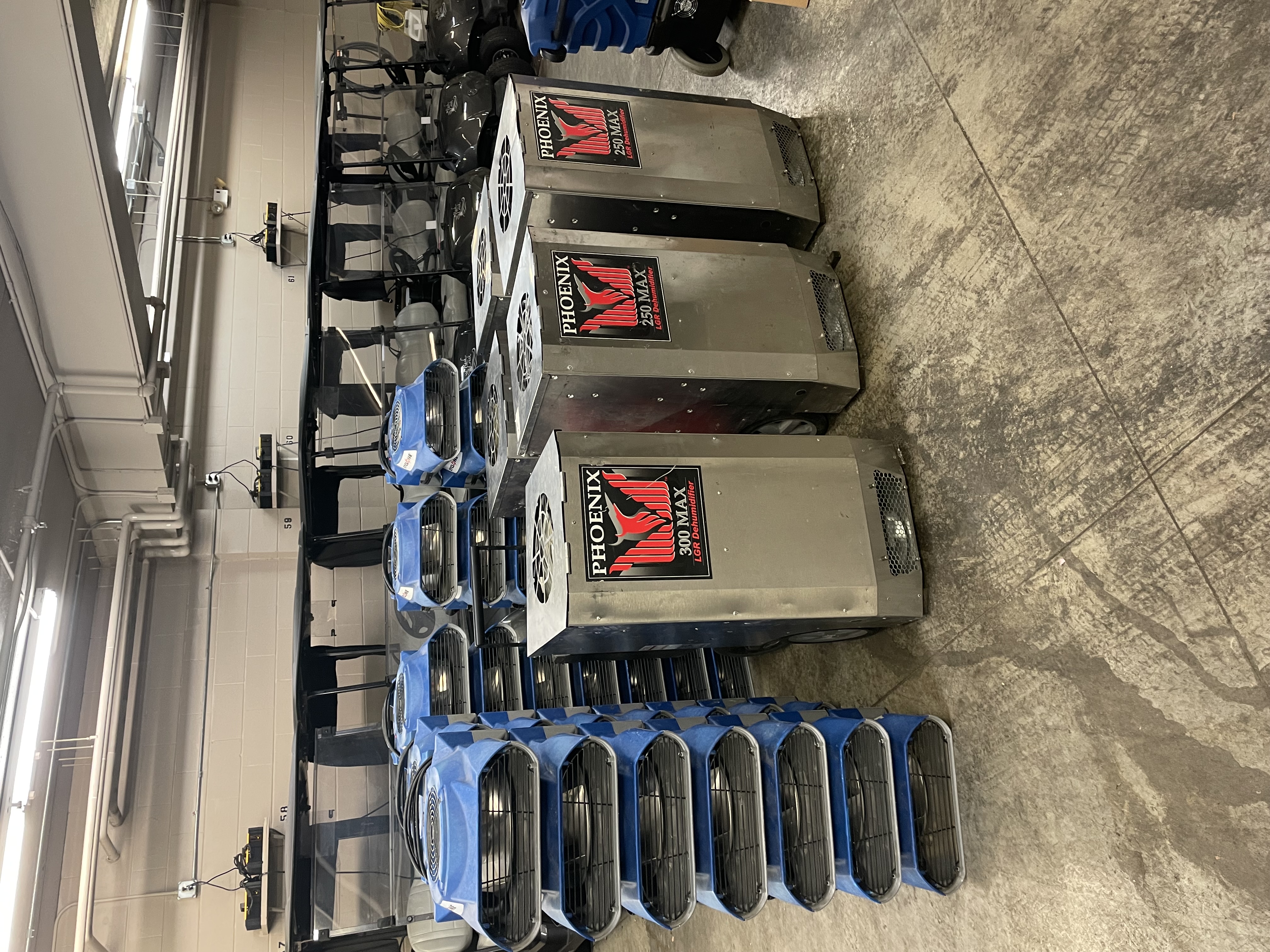Professional contents restoration equipment warehouse with Phoenix dehumidifiers and air movers in Twin Cities Minnesota